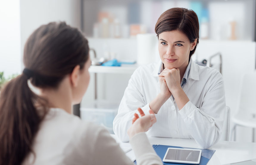 Doctor and patient discussing abortion decision 