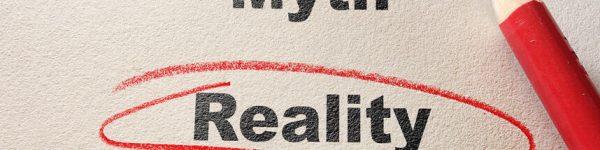 The words Myth vs Reality, circled with red pencil on textured paper